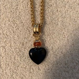 Black heart pendant necklace by Joan Rivers